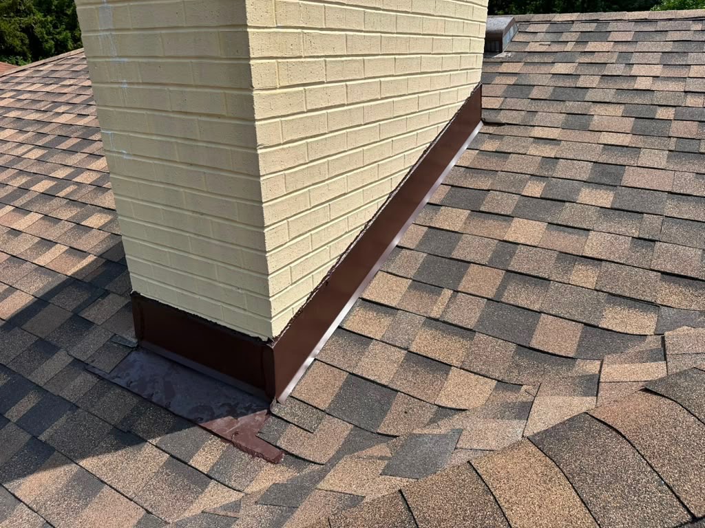 New chimney flashing detail against shingles